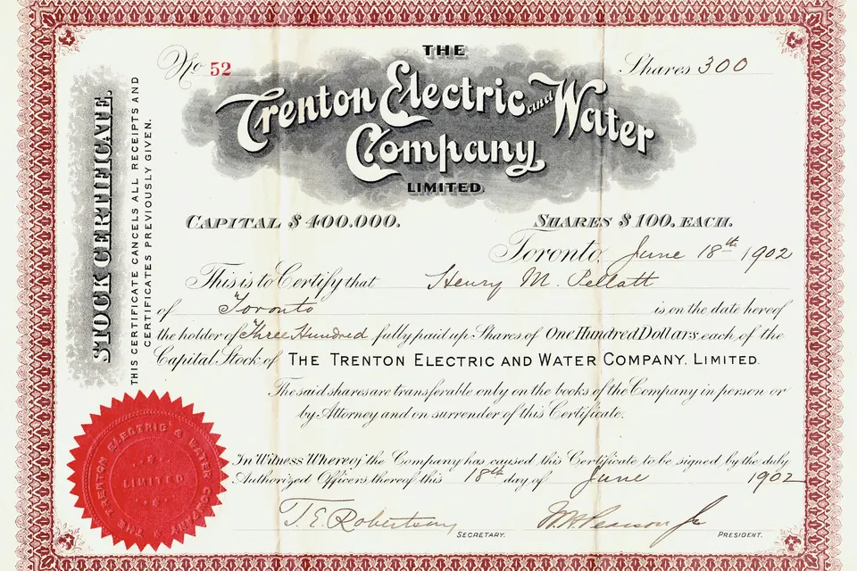 An early 20th-century engraved share certificate with a red seal